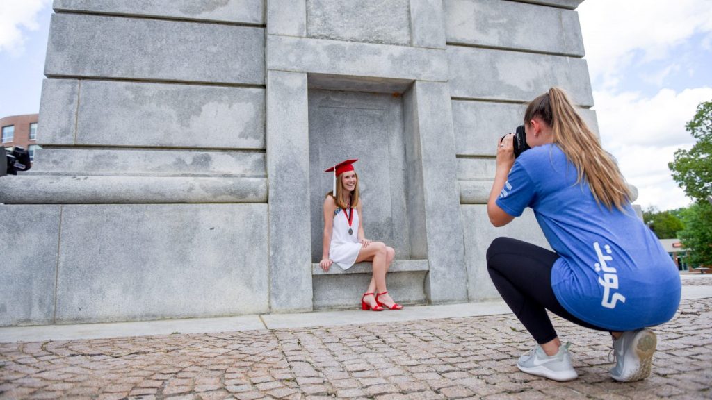 Student takes photos at Belltower