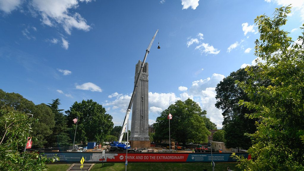 A crane preparing to lower a bell into the Belltower.
