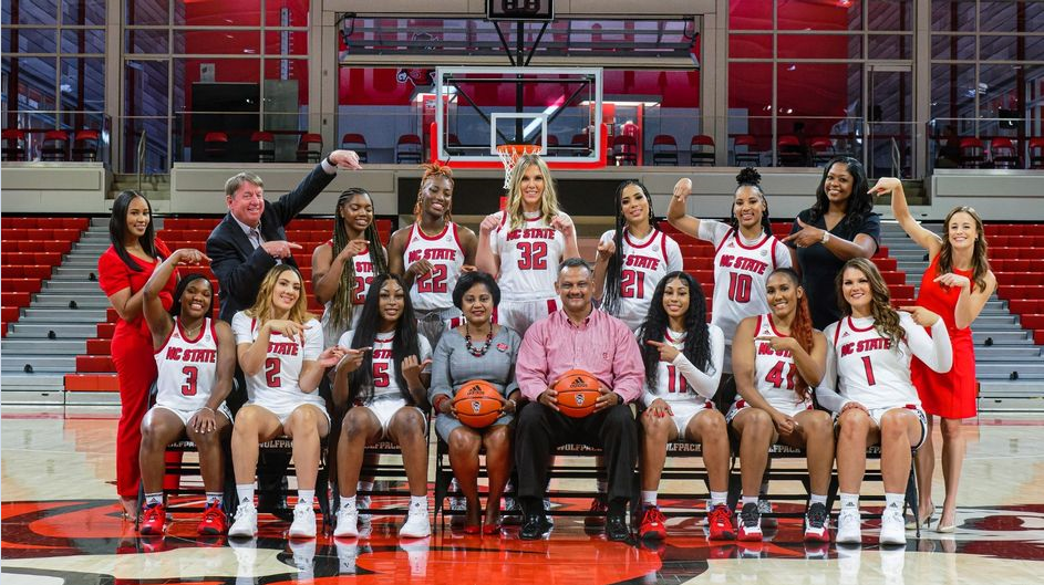 The Lanier family with the women's basketball team. 