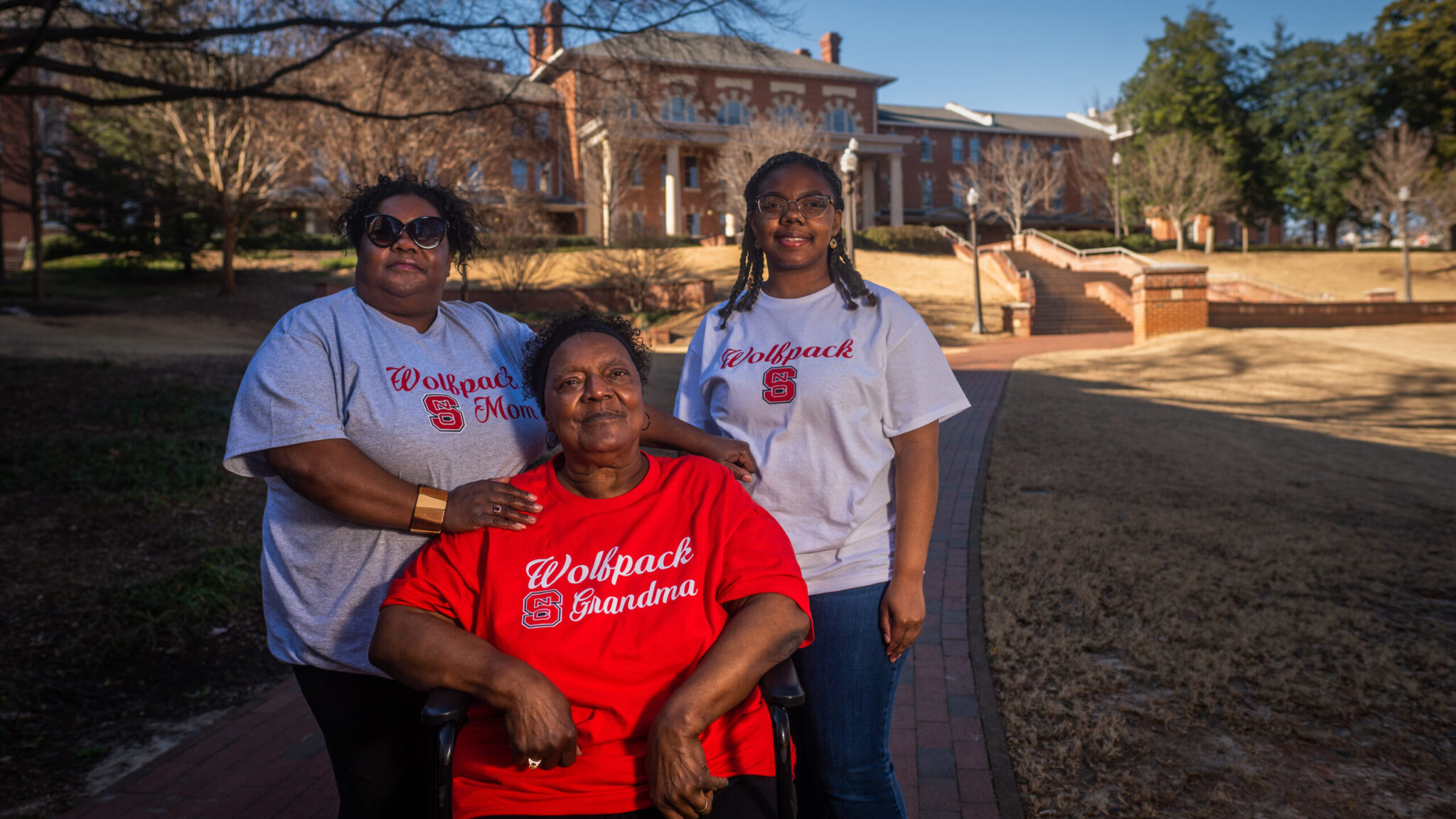 Kacey Cooper '23, right, walks the same path her grandmother Phyllis Brown Harris often took when she worked at NC State, with support from her scholarship and her family, including her mother Kathy Harris Cooper, left. Photo by Marc Hall