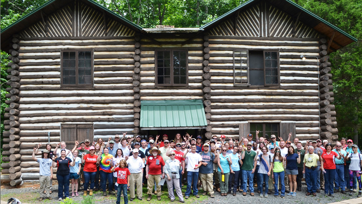 CNR students gathered outside a building at Slocum Hill camp.