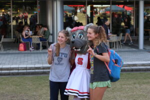 Students posing with Ms. Wuf