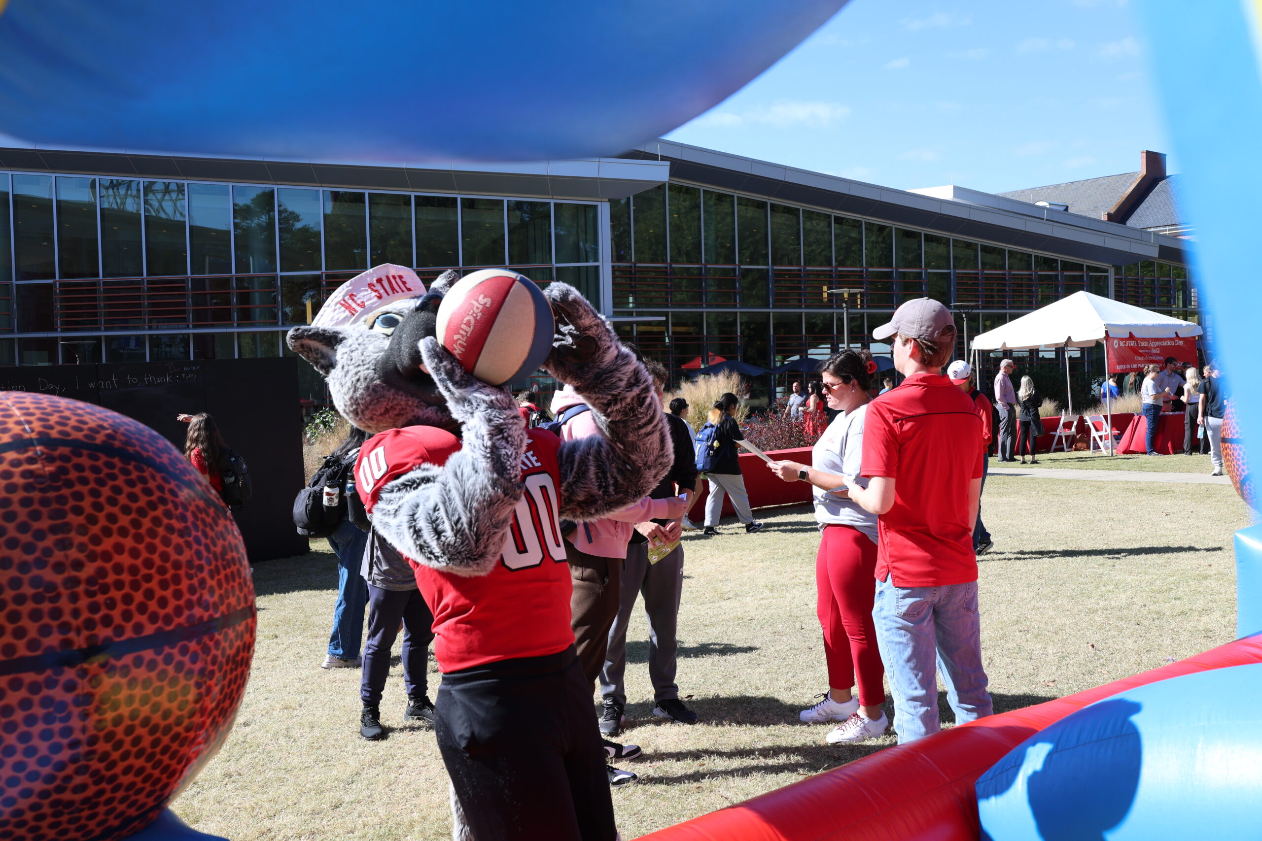 Mr Wuf shooting a basketball