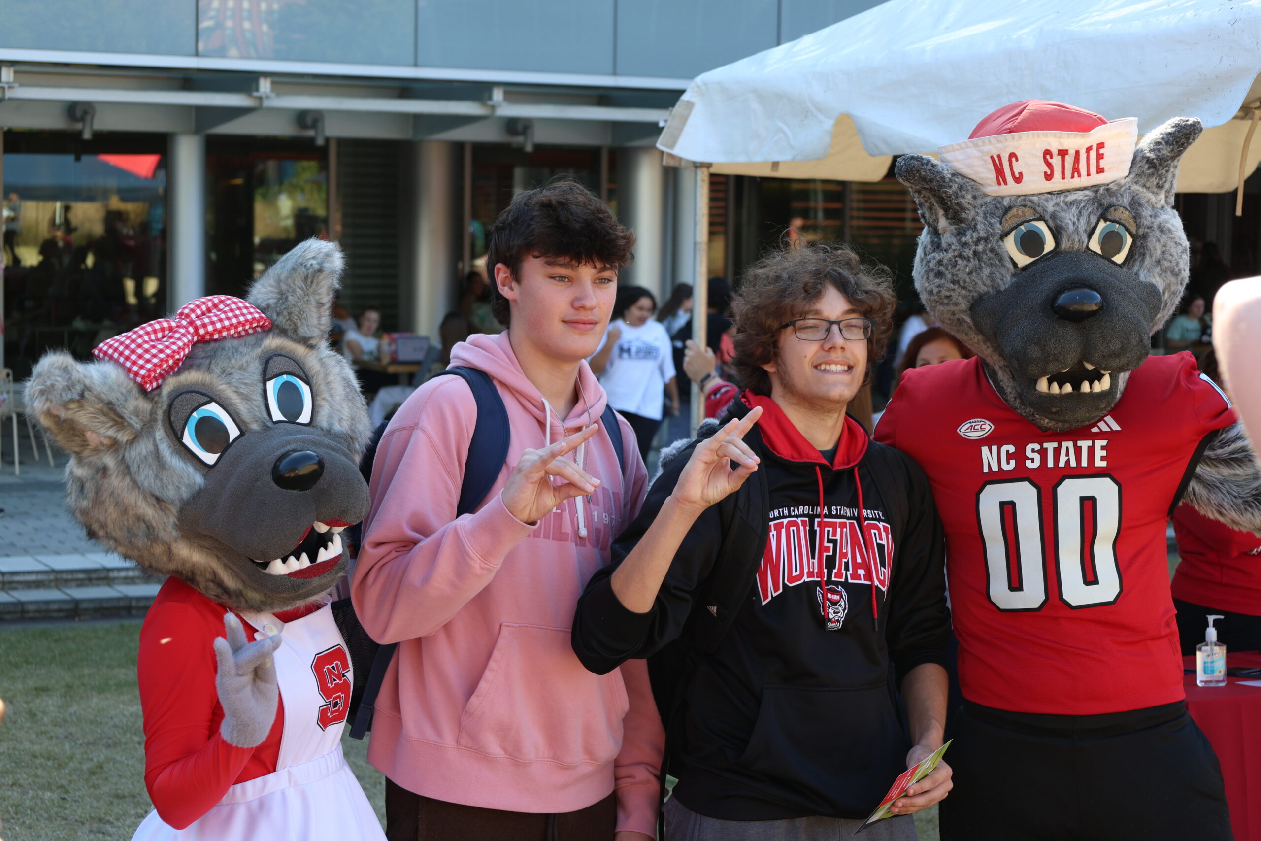 The Wufs posing with students.