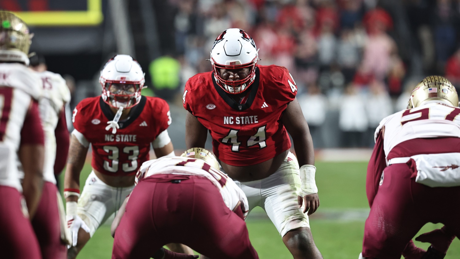 Brandon Cleveland preparing to make a play on the football field